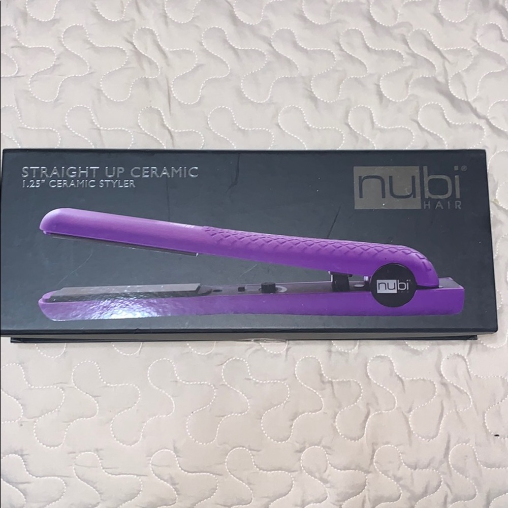 Nubi flat iron 1.25” ceramic styler. Brand new